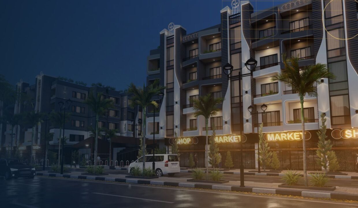 Abtal Hurghada Developer residential project at dusk with lit shops and palm-lined street